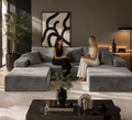 Canapé modulable compressé en U ZESOFA en velours côtelé gris, deux femmes assises dans un salon contemporain